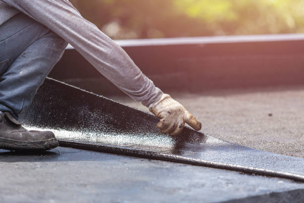 Professional Emergency Waterproofing technician working in Leonard, MI
